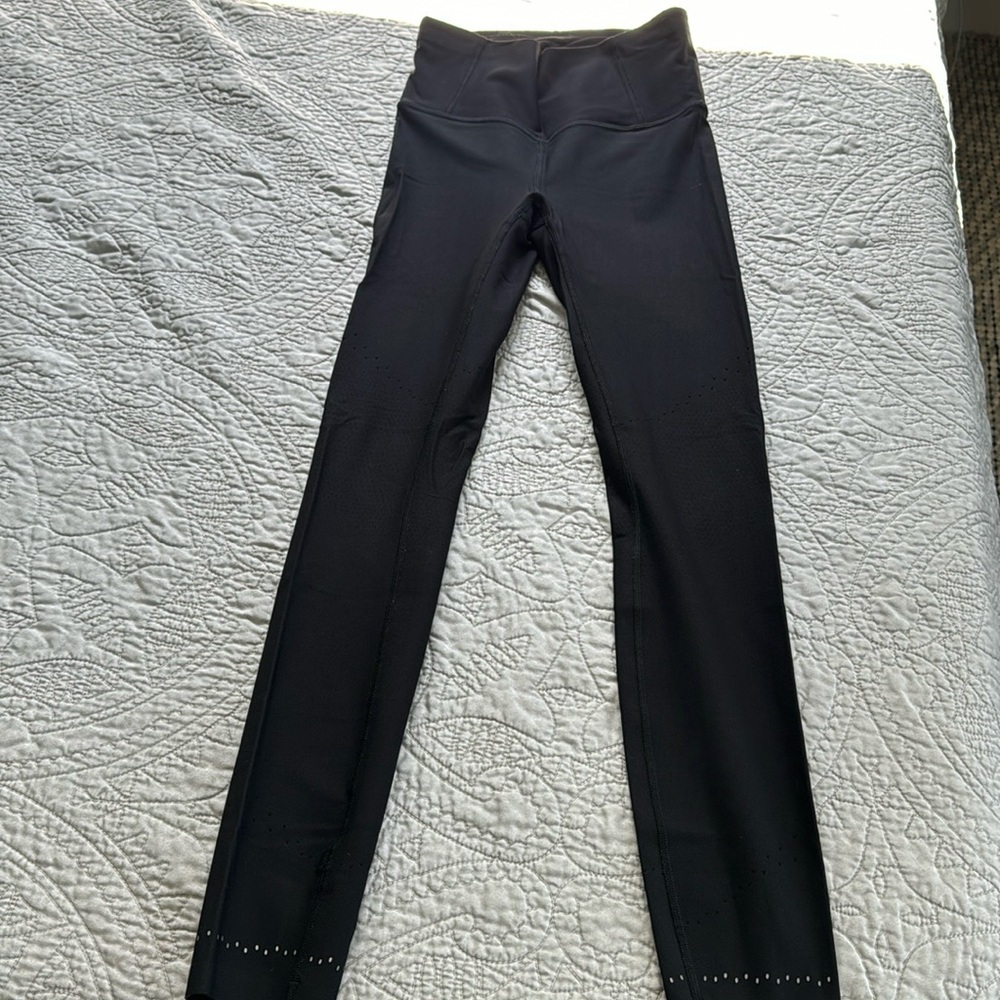lululemon compressive, full length tight with back zipper pocket. Small/6